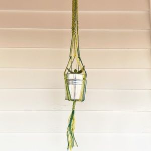 Handmade green and gold macrame plant hanger